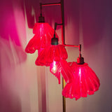 Arise Arbor Floor Lamp, red shades in a dark room