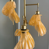 Arise Arbor Floor Lamp, amber shades close-up