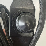Close-up of the inline rotary dimmer on the black cord