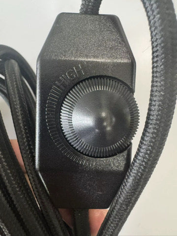 Close-up of the inline rotary dimmer on the black cord