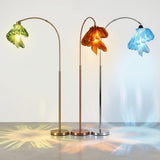 Arc Arise Standing Lamps in gold, bronze and chrome with green, amber and blue shades